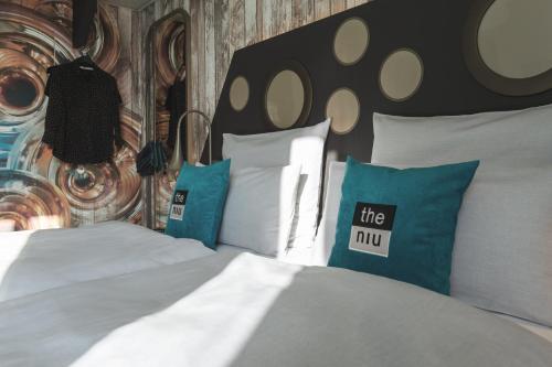 Holiday Inn - the niu, Brass Munich Olympiapark by IHGにあるベッド