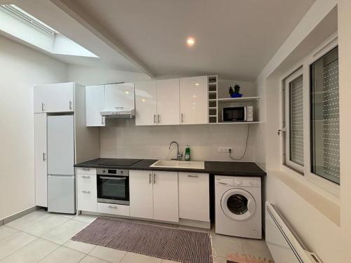 Η κουζίνα ή μικρή κουζίνα στο Charmant appartement cosy