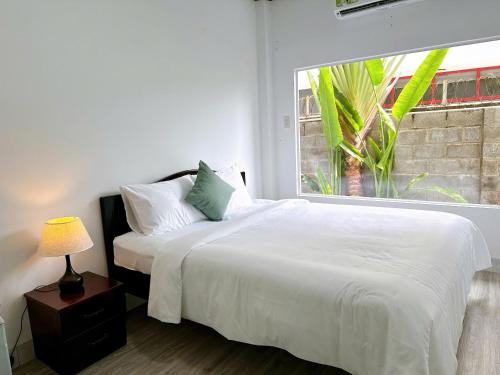 Postel nebo postele na pokoji v ubytování Inner Peace Homestay Phan Thiet