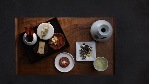 a table topped with different types of food on it at Grand InterContinental Seoul Parnas by IHG in Seoul