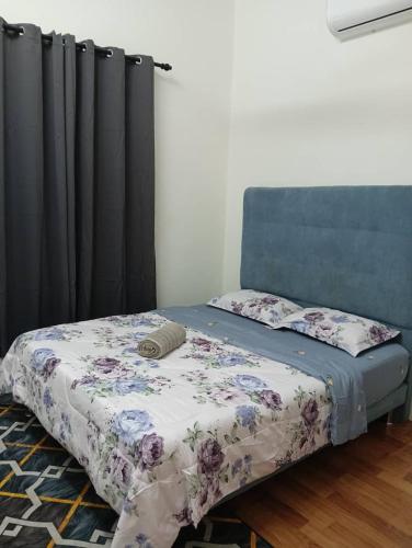 Кровать или кровати в номере HOMESTAY RANTAU PANJANG KELANTAN - Uni Homestay