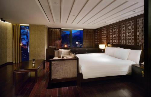 Postel nebo postele na pokoji v ubytování Banyan Tree Club & Spa Seoul