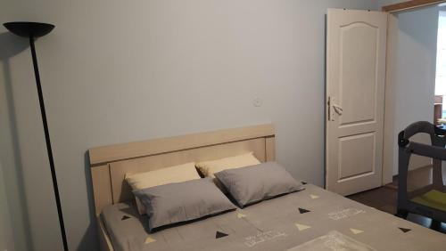 Postel nebo postele na pokoji v ubytování Kucerak u Sremu
