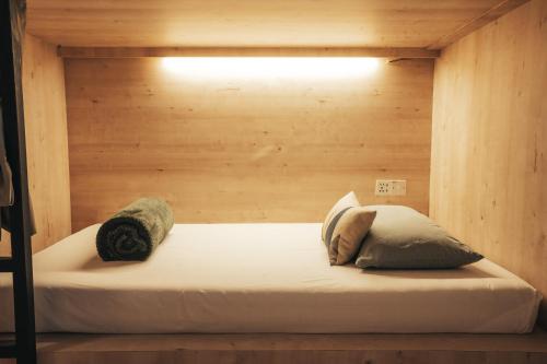 Dé Cafe & Rest Houseにあるベッド