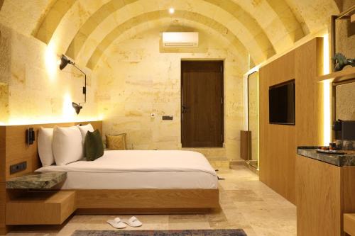 Postel nebo postele na pokoji v ubytování Mare Cappadocia