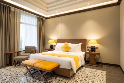 Senna Hue Hotelにあるベッド