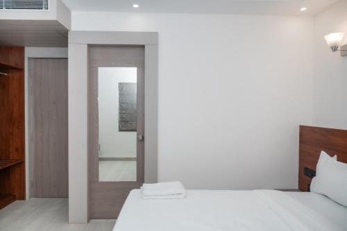Katil atau katil-katil dalam bilik di Gold Inn Exotica