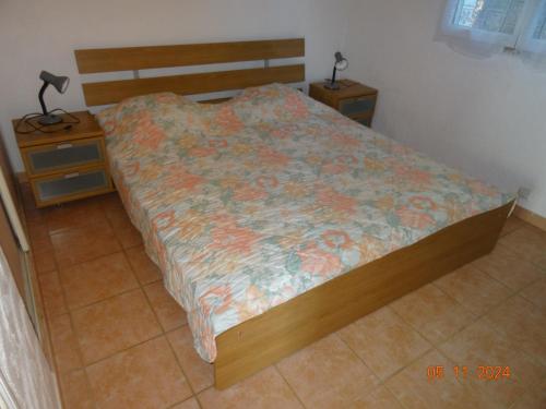 Ένα ή περισσότερα κρεβάτια σε δωμάτιο στο Villa indépendante 2/5 personnes - Palombaggia Vue mer magnifique Porto Vecchio