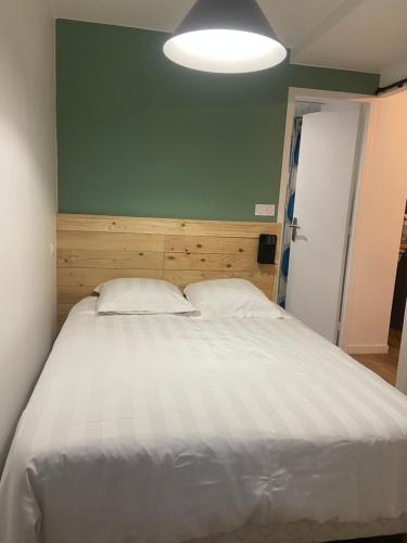 Ένα ή περισσότερα κρεβάτια σε δωμάτιο στο Appartement T2 meublé 2ter