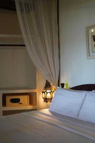 Kijani Hotelにあるベッド