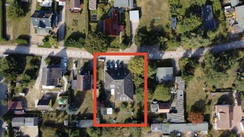 an aerial view of a house in a suburb at Luft in Ostseebad Koserow