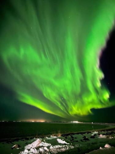 an image of the northern lights in the sky at Premium apartment Queen downtown in Reykjavík