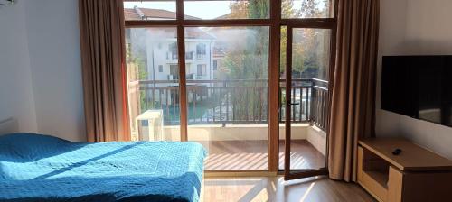 Postel nebo postele na pokoji v ubytování Apartment Hotel & SPA Aheloy