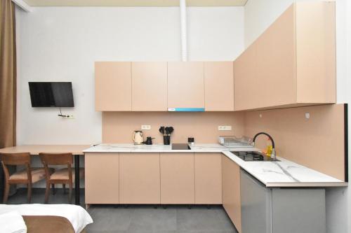 Kuchyň nebo kuchyňský kout v ubytování Seva Apart-Hotel Komitas
