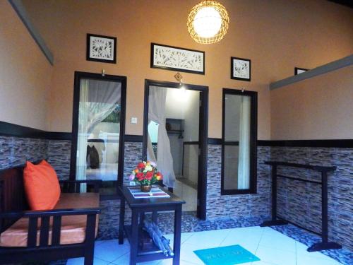 Posezení v ubytování Putu Guest House Pemuteran