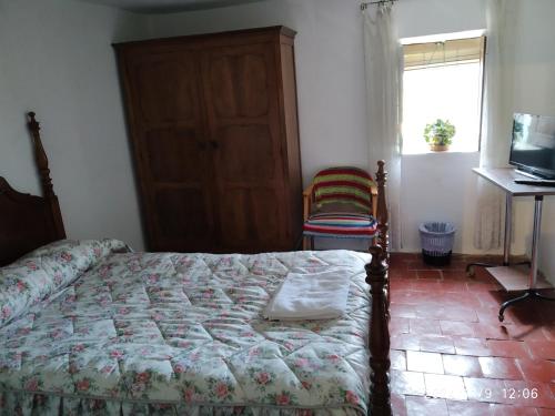 Ένα ή περισσότερα κρεβάτια σε δωμάτιο στο La Casita de San Nicolás