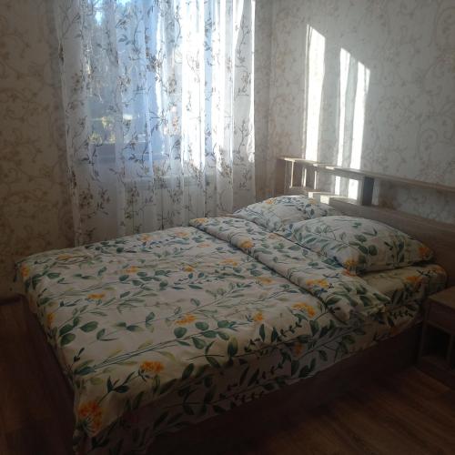 Postel nebo postele na pokoji v ubytování Violet guest house