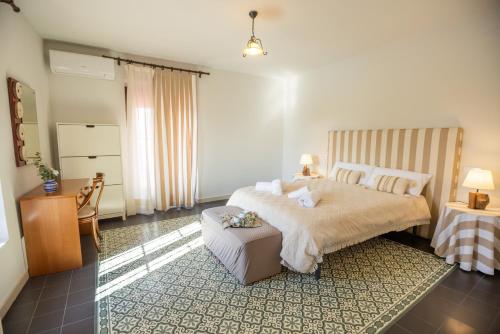 Postel nebo postele na pokoji v ubytování Casa Rural Teralba