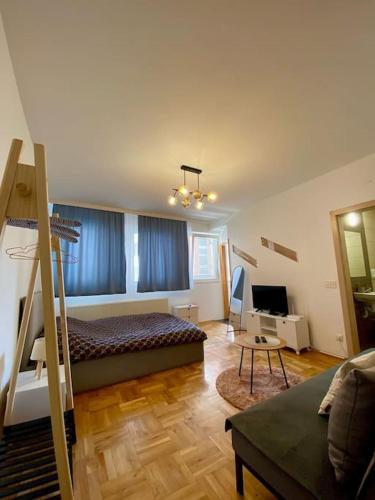 Llit o llits en una habitació de Geon Apartament