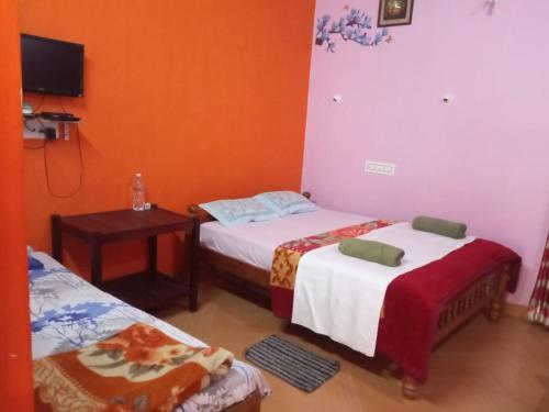 Postel nebo postele na pokoji v ubytování bareside ESTATE STAY