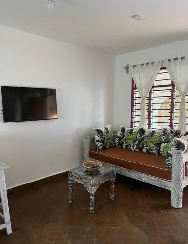 Una televisión o centro de entretenimiento en Studio Leliya