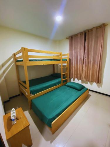 Ένα ή περισσότερα κρεβάτια σε δωμάτιο στο Condominio el sol