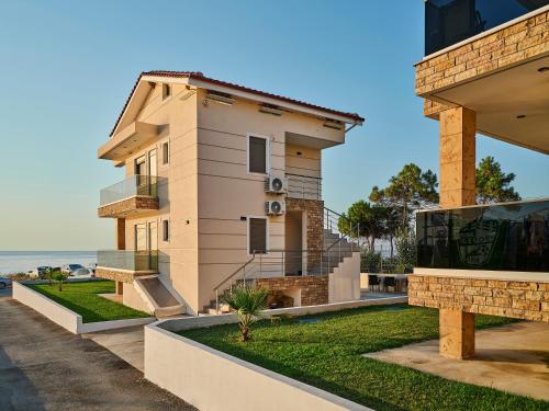 a house with a view of the ocean at Atel Villas in Xanthi
