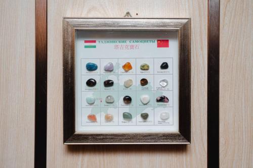 a framed picture of a display of rocks at Royal Raj Hotel in Rājshāhi