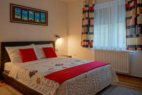 Postel nebo postele na pokoji v ubytování Apartments Paradise