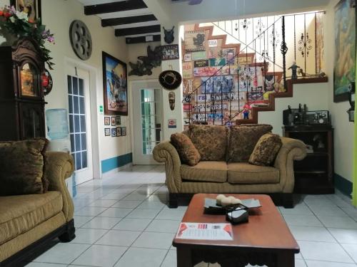 Posezení v ubytování HOTEL CASA BONITA LA LIMA SAN PEDRO SULa