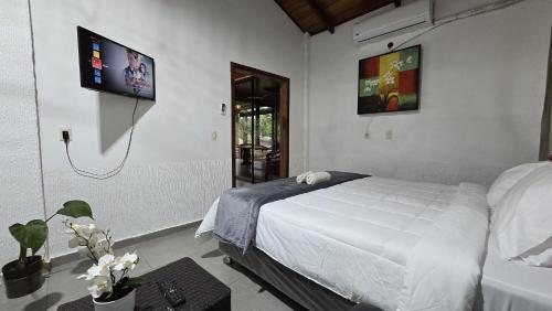 Postel nebo postele na pokoji v ubytování Habitación sin cocina en quinta Shizen