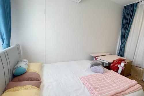 Letto o letti in una camera di Niche Mono 2 Bedroom next to BTS Bearing