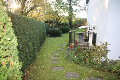 Taman di luar Souterain Appartement 19 min zu Fuß Downtown