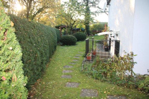 Taman di luar Souterain Appartement 19 min zu Fuß Downtown