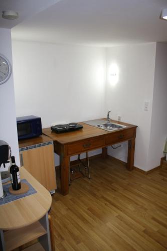 Dapur atau dapur kecil di Souterain Appartement 19 min zu Fuß Downtown