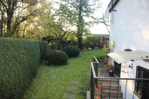Taman di luar Souterain Appartement 19 min zu Fuß Downtown