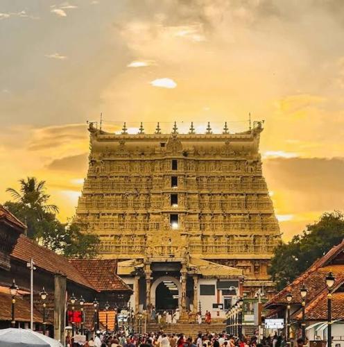 a group of people standing around a large building at La Casa Trivandrum 4 BHK AC Luxury Villa at City Centre, Just 5 kms from Airport & 3 Kms to Trivandrum Railway Station in Trivandrum