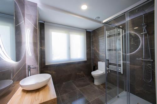 Ένα μπάνιο στο Apartamentos O Devezo