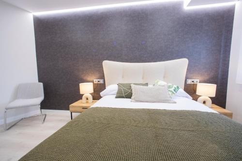 Ένα ή περισσότερα κρεβάτια σε δωμάτιο στο Apartamentos O Devezo