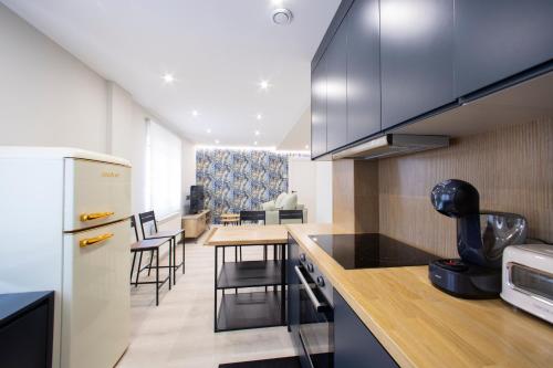 Η κουζίνα ή μικρή κουζίνα στο Apartamentos O Devezo