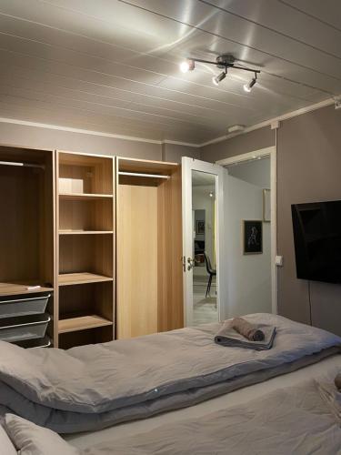 Postel nebo postele na pokoji v ubytování Stilren leilighet i Narvik!