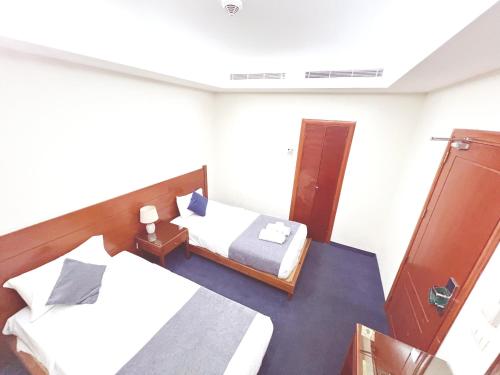 Postel nebo postele na pokoji v ubytování Caesar's Park Hotel