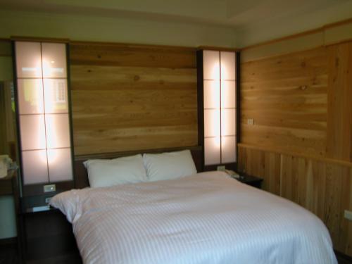 Una cama o camas en una habitación de Dreamtown