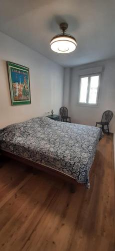 En eller flere senge i et værelse på Coria del Río