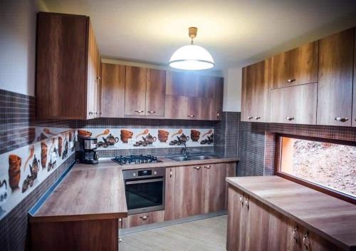 Dapur atau dapur kecil di Pensiunea Valea Râsului