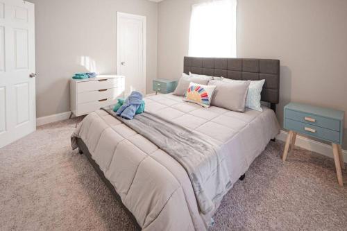 Ένα ή περισσότερα κρεβάτια σε δωμάτιο στο Adorable Stylish 1bed 1 bath