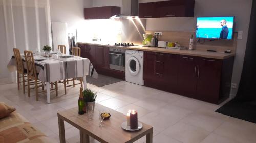 Kuchyň nebo kuchyňský kout v ubytování Maison de charme avec cour privée