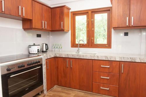 Kuchyň nebo kuchyňský kout v ubytování Tranquillity Villa