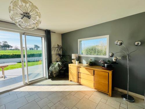 Maison dans cadre verdoyant, 20min des plages