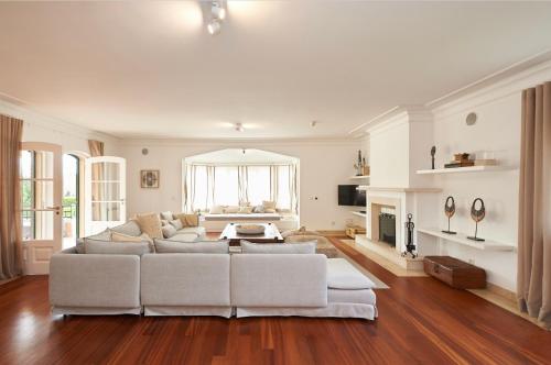 Noble beach villa with private garden and pool